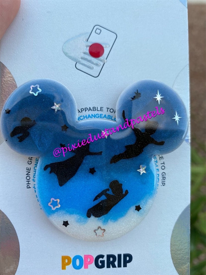 Peter Pans Magical Flight Phone Grip! Fly away to Neverland with this Badge Reel or Phone Socket -